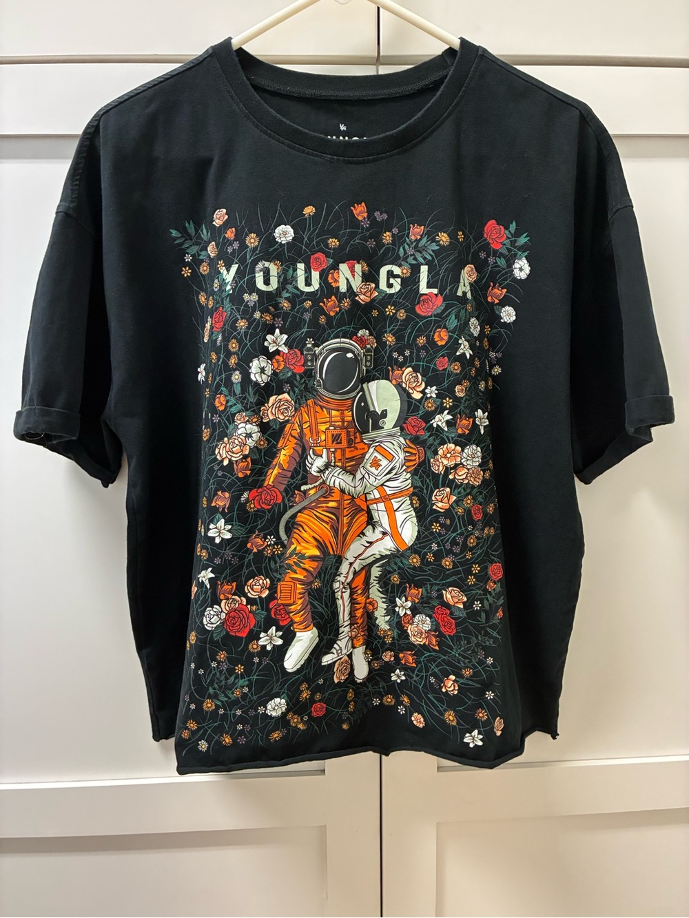 Women’s Youngla Black Graphic Tee with Orange Astronaut Design Size L